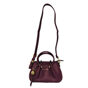 Sac bourse TED LAPIDUS Gretel couleur bordeaux, petit format élégant pour femme